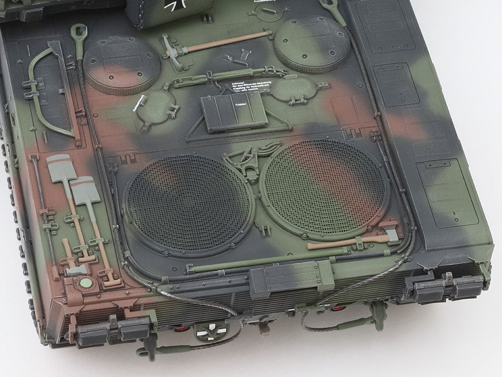 709 - Leopard 2A7V - painted model - Photo-etched engine grille mesh parts add further detail. Engine deck caution notices are decals.