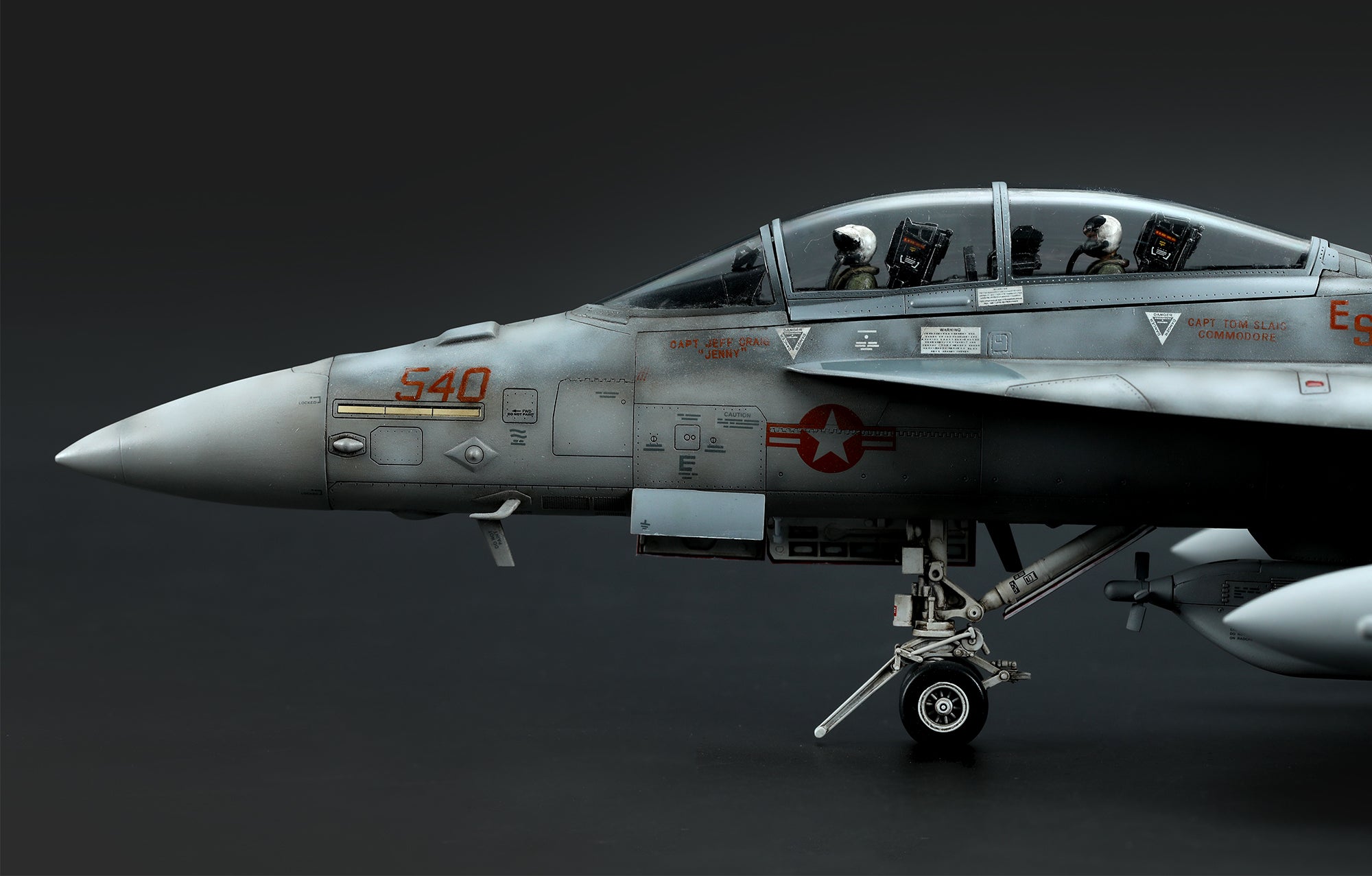 painted model - Two U.S. Navy pilot figures featuring realistic gestures and finely replicated suit and equipment are included. Two flight helmet options are provided.